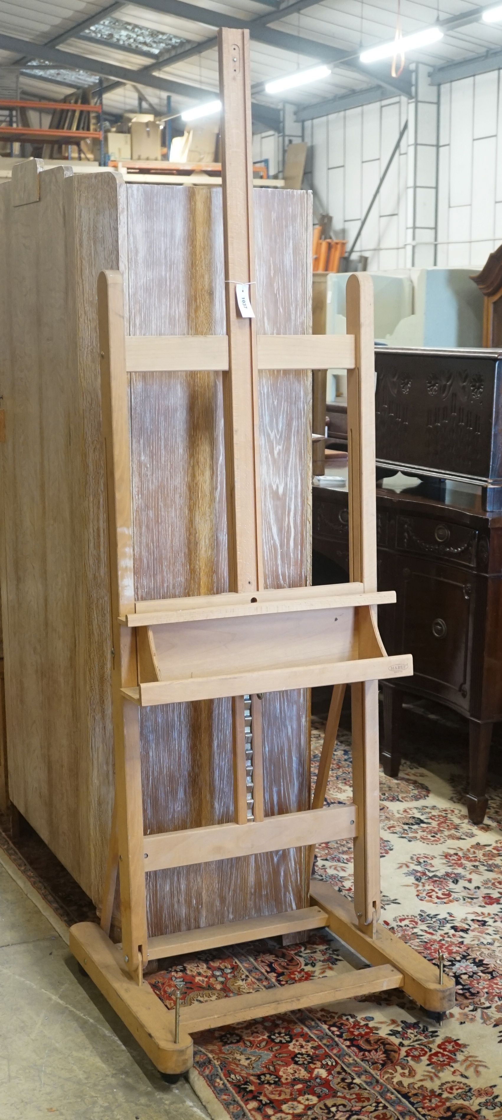 An Italian beech artist studio easel by Mabef, width 60cm height 188cm